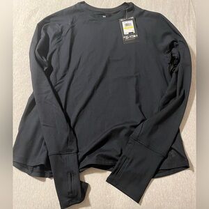Women’s Under Armor long-sleeve performance fabric shirt, size Medium, black.